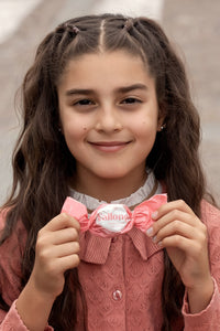 Thumbnail for CIASTECZKA ORZECHOWE Z NADZIENIEM Z GORZKIEJ CZEKOLADY W TORBIE Z KOKARDĄ 150 G