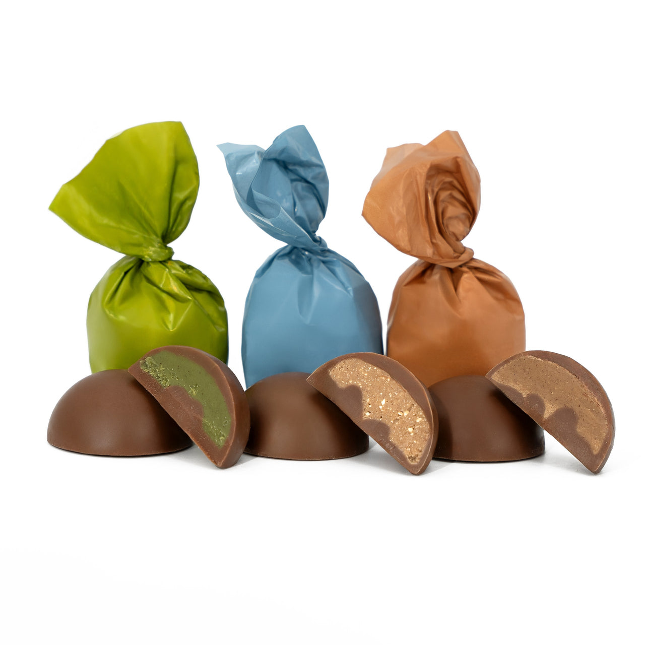 CZEKOLADKI Z NADZIENIEM O SMAKU PISTACJI, ORZECHA LASKOWEGO I NUGATU W OZDOBNEJ METALOWEJ PUSZCE 180 G